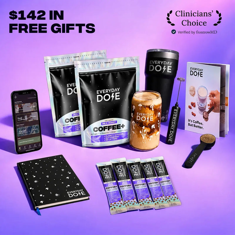 Promotional display of Everyday Dose coffee products including pouches tumbler jar booklet scoop sample packs and smartphone on purple background