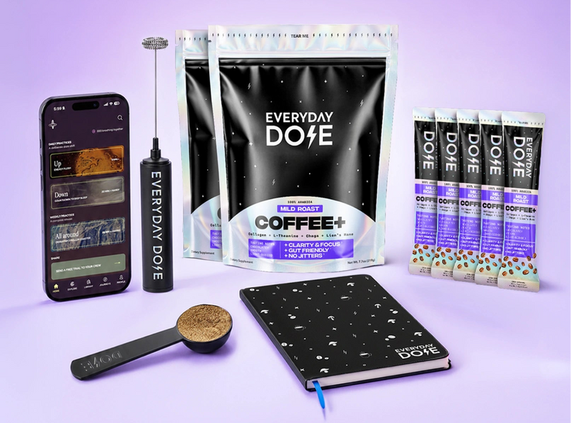 A promotional bundle for the Everyday DoSE Coffee+ starter kit, featuring a smartphone app screen, a black frother, two black coffee pouches, five single-serve coffee sticks, a scoop, a black notebook, and a purple background with sale text reading 'End of Summer Sale +$100 Value Starter Kit - FREE!'.