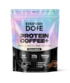 Colorful package of protein coffee cold brew with nutrition facts and coffee beans on a black background