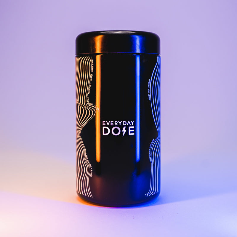 The Coffee Vessel by Everyday Dose: sleek black container with wavy lines design, illuminated by orange and blue lighting