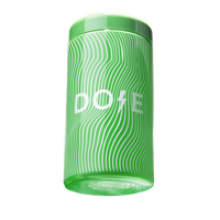The Matcha Vessel by Dose featuring green wavy pattern design on cylindrical tea container with matching lid