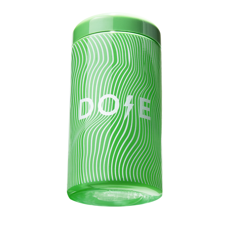 The Matcha Vessel by Dose featuring green wavy pattern design on cylindrical tea container with matching lid