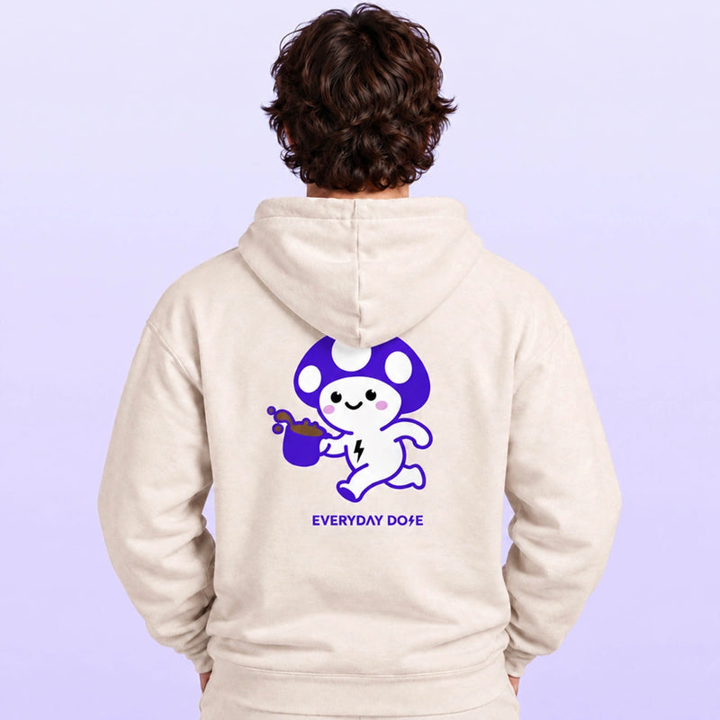 Back view of a person in a cream hoodie featuring a purple and white cartoon character graphic with Everyday Dope text against a lavender background